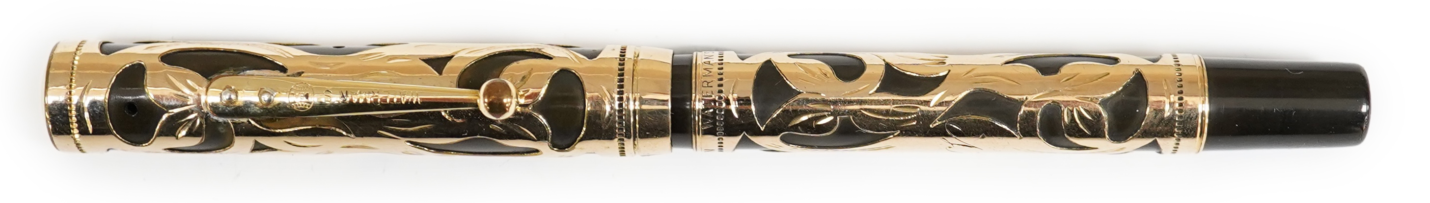 A Waterman gold filled filigree Eyedropper fitted with 14ct. gold No.4 Waterman nib